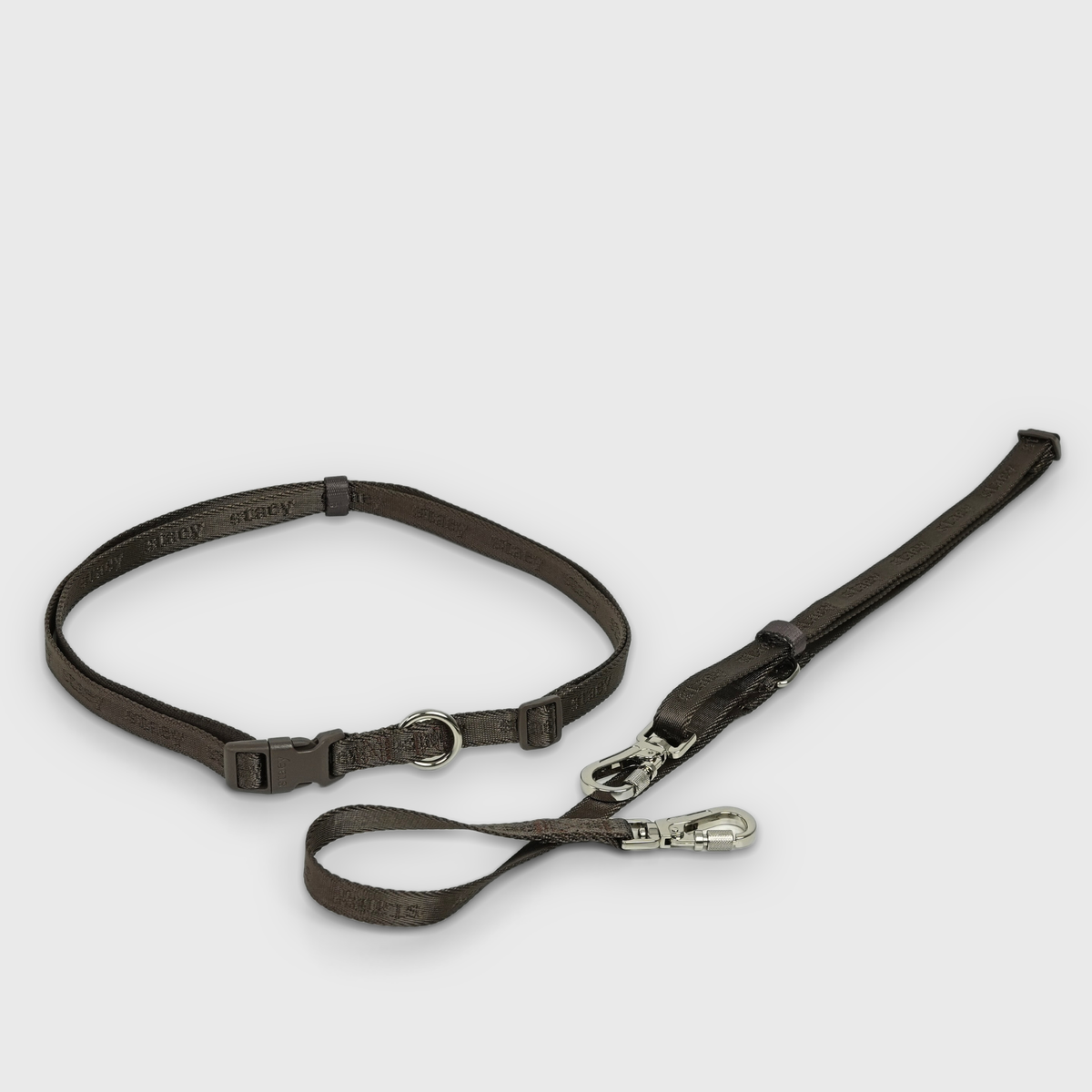 The mocca hands-free leash laid out with its waist strap and hooks